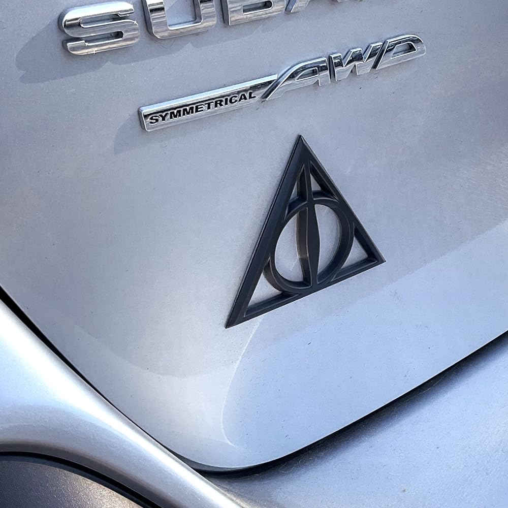 Fan Emblems Deathly Hallows Car Emblem - Harry Potter Symbol 3D Auto Badge - Color: Matte Black - Size: 3.7 X 3.2 X 0.2 Inches -