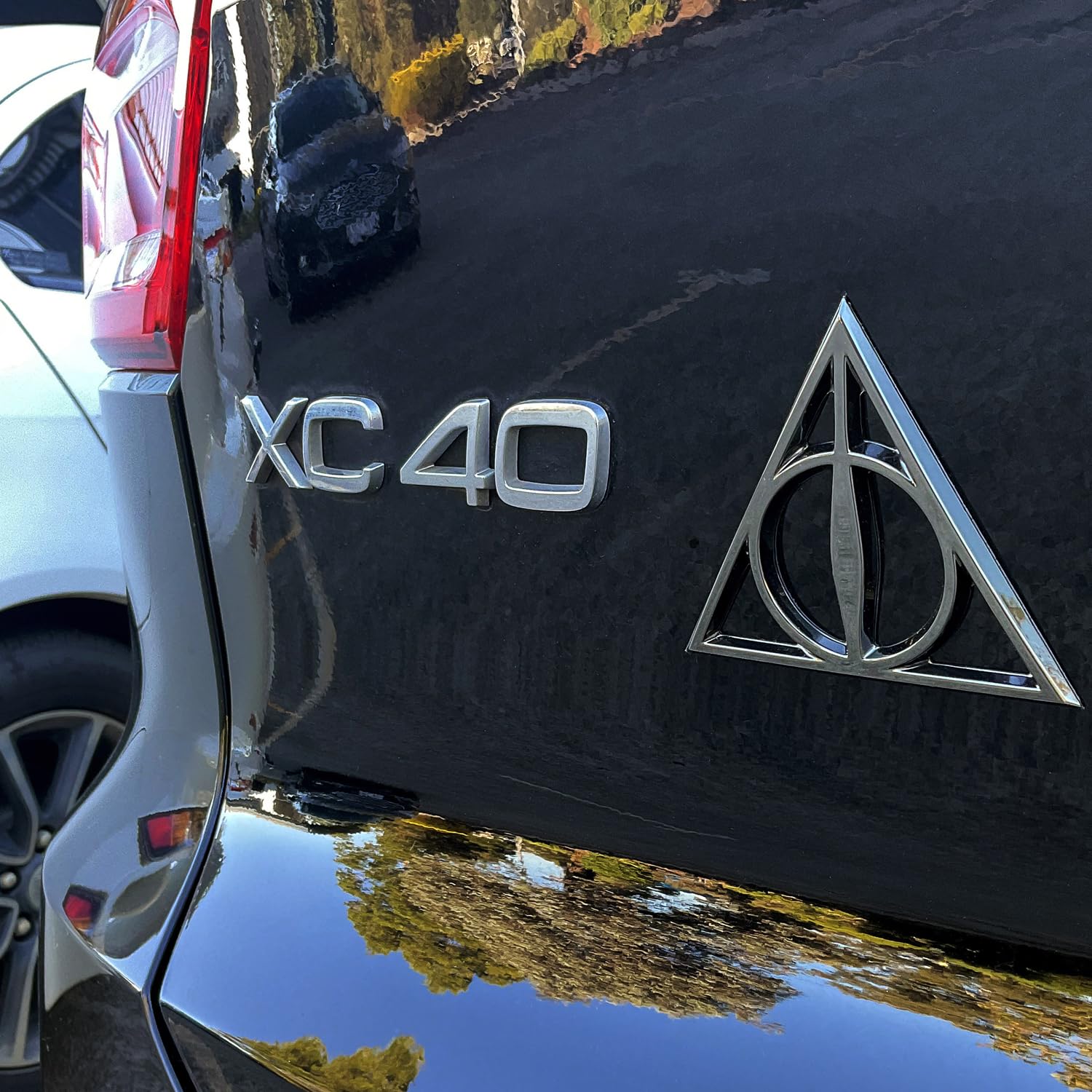 Fan Emblems Deathly Hallows Car Emblem - Harry Potter Symbol 3D Auto Badge - Color: Black Chrome - Size: 3.7 X 3.2 X 0.2 Inches