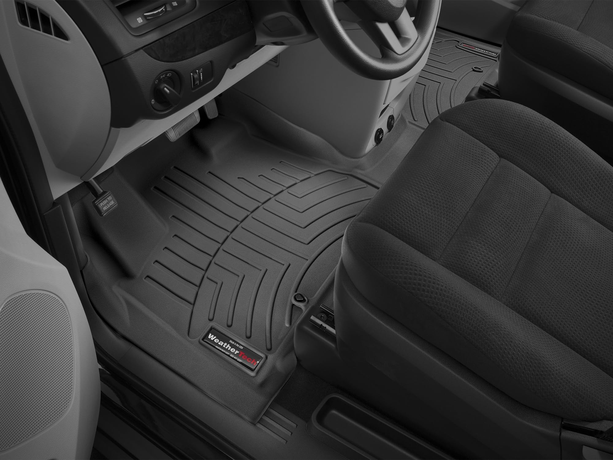 WeatherTech Custom Fit FloorLiners for Town & Country Van, Grand Caravan - 1st Row - Over The Hump (445621), Black