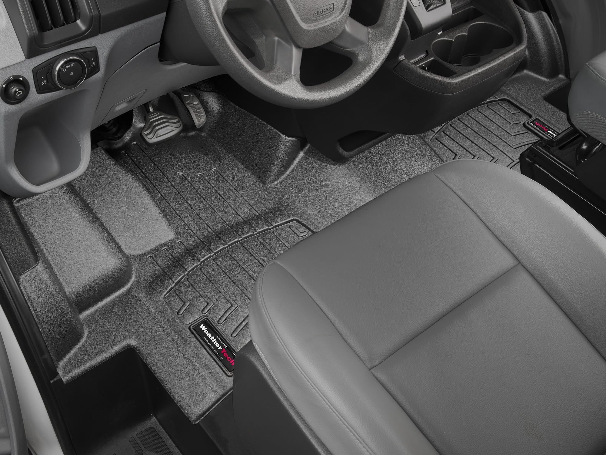 WeatherTech Custom Fit FloorLiners for Ford Transit - 1st Row - Over The Hump (447391), Black